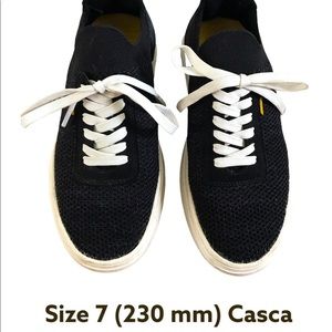 Casca Avro shoes in black with white soles.